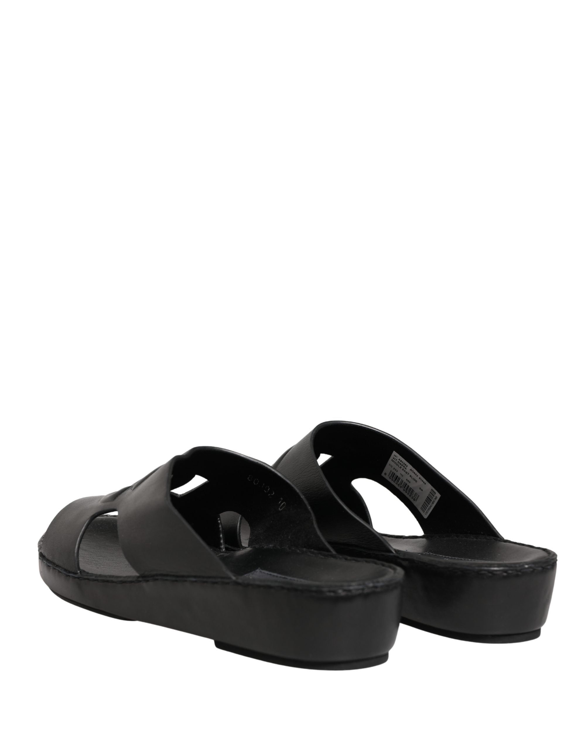 Sandales en cuir noir Dolce & Gabbana avec découpe et logo DG, chaussures élégantes pour femmes.