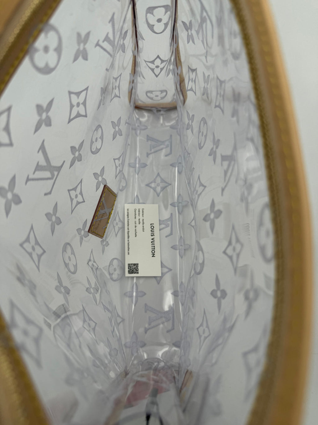 Pochette transparente Louis Vuitton Monogram, sac élégant en toile avec motif emblématique, idéal pour accessoires ou petits objets.