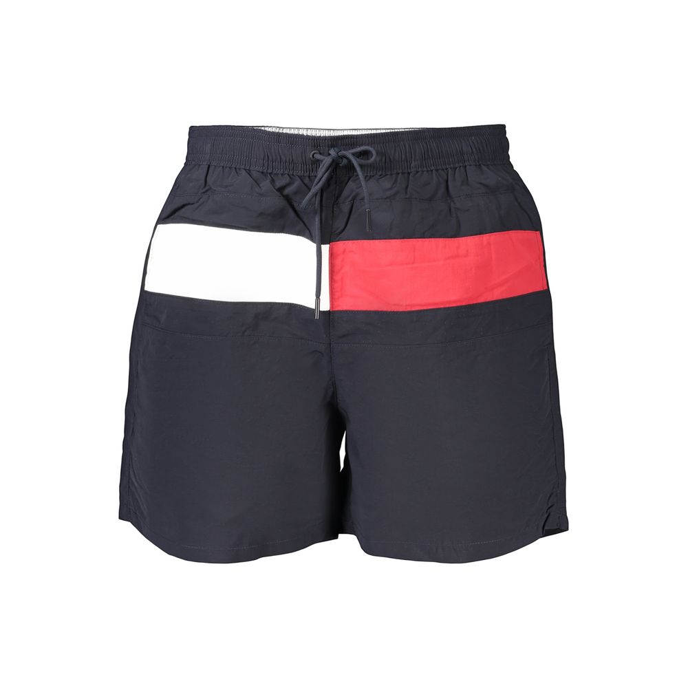 Shorts de bain pour homme Tommy Hilfiger en polyester bleu, avec logo distinctif, parfait pour la plage ou la piscine.