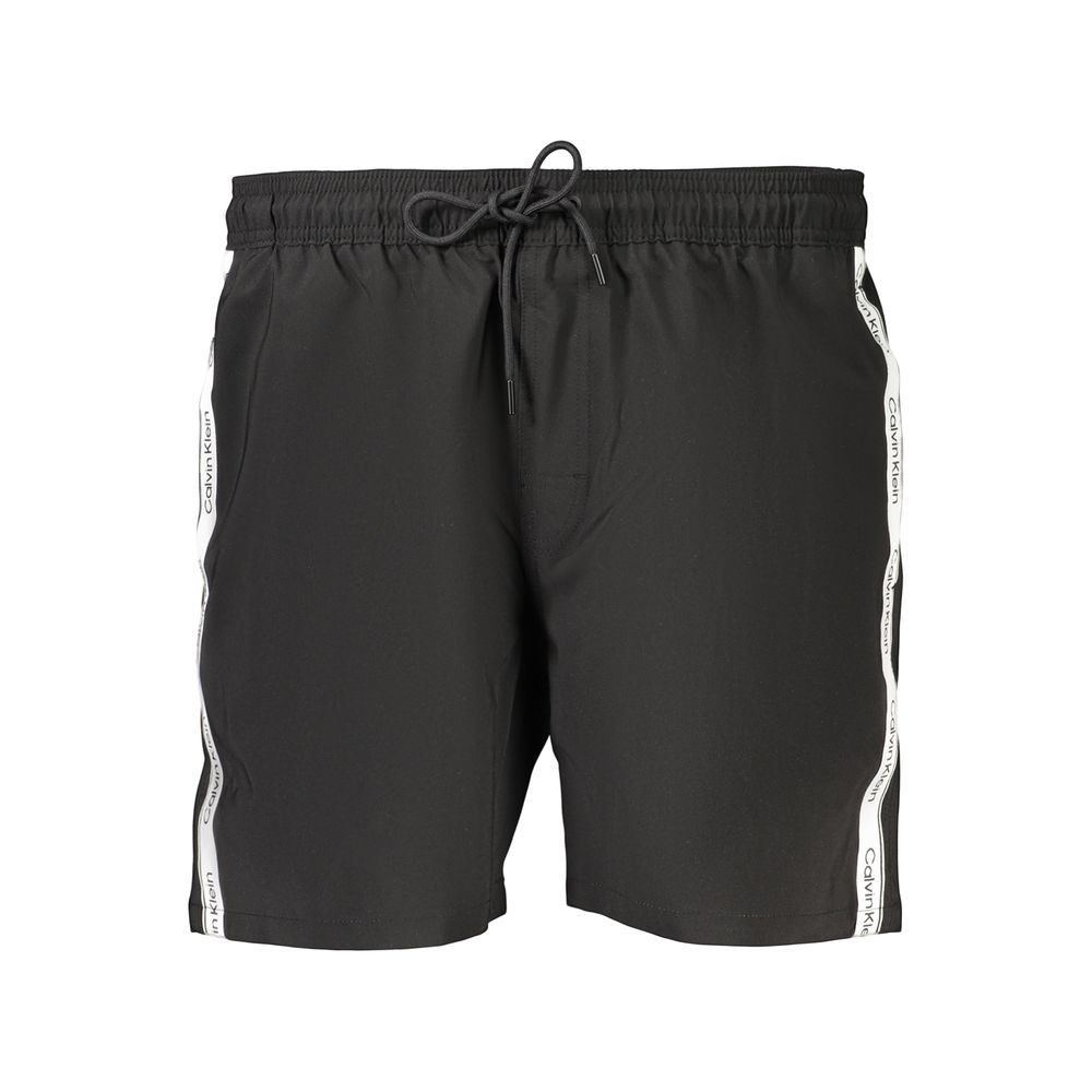 Boxers pour hommes Calvin Klein en polyester noir, coupe confortable et élégante, visible dans l'image.