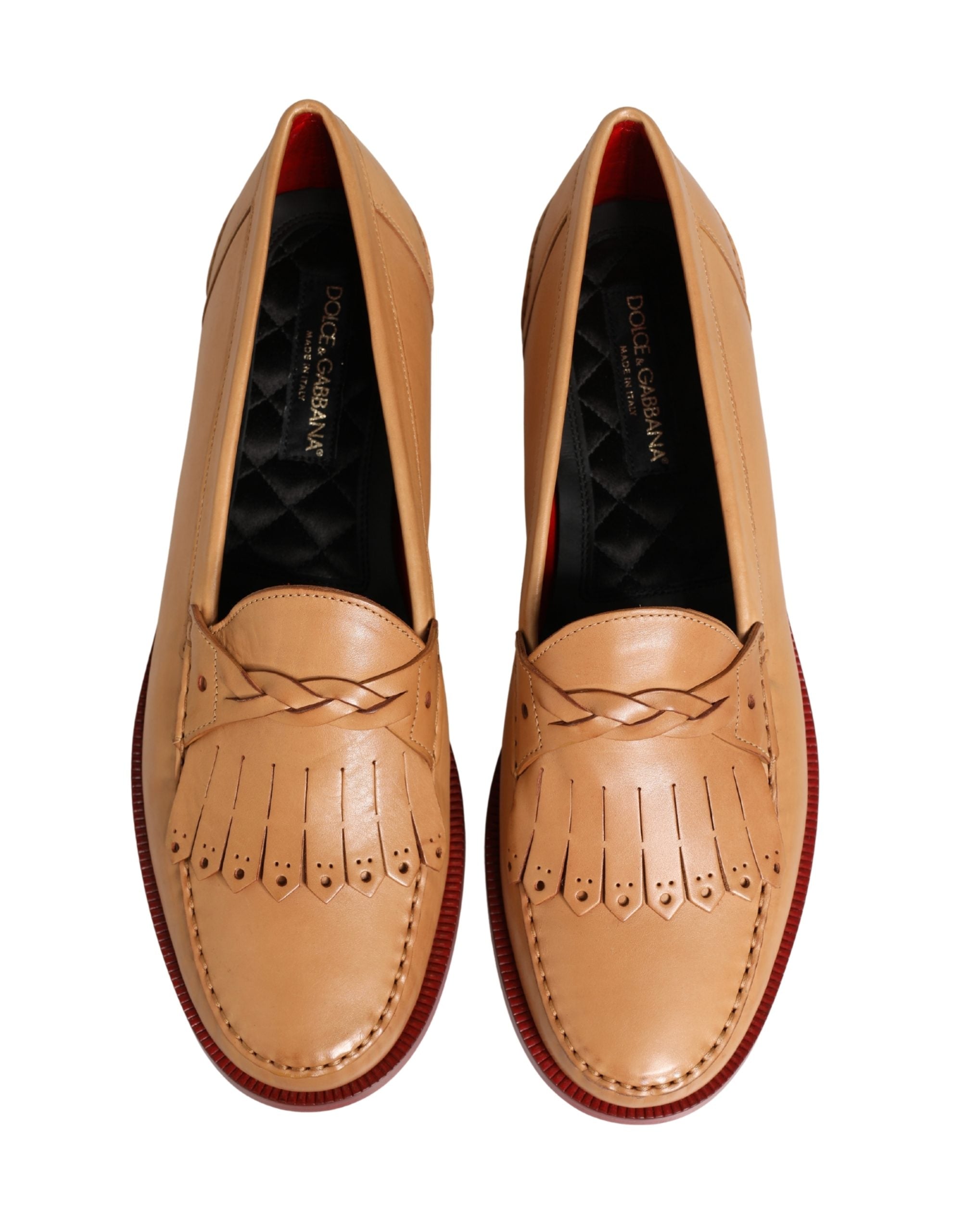 Chaussures slip-on en cuir beige avec pompons en franges de Dolce & Gabbana pour homme, élégantes et confortables.