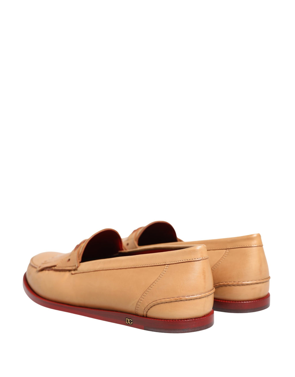 Chaussures loafer en cuir beige avec pampilles de Dolce & Gabbana pour homme, slips élégants et confortables.