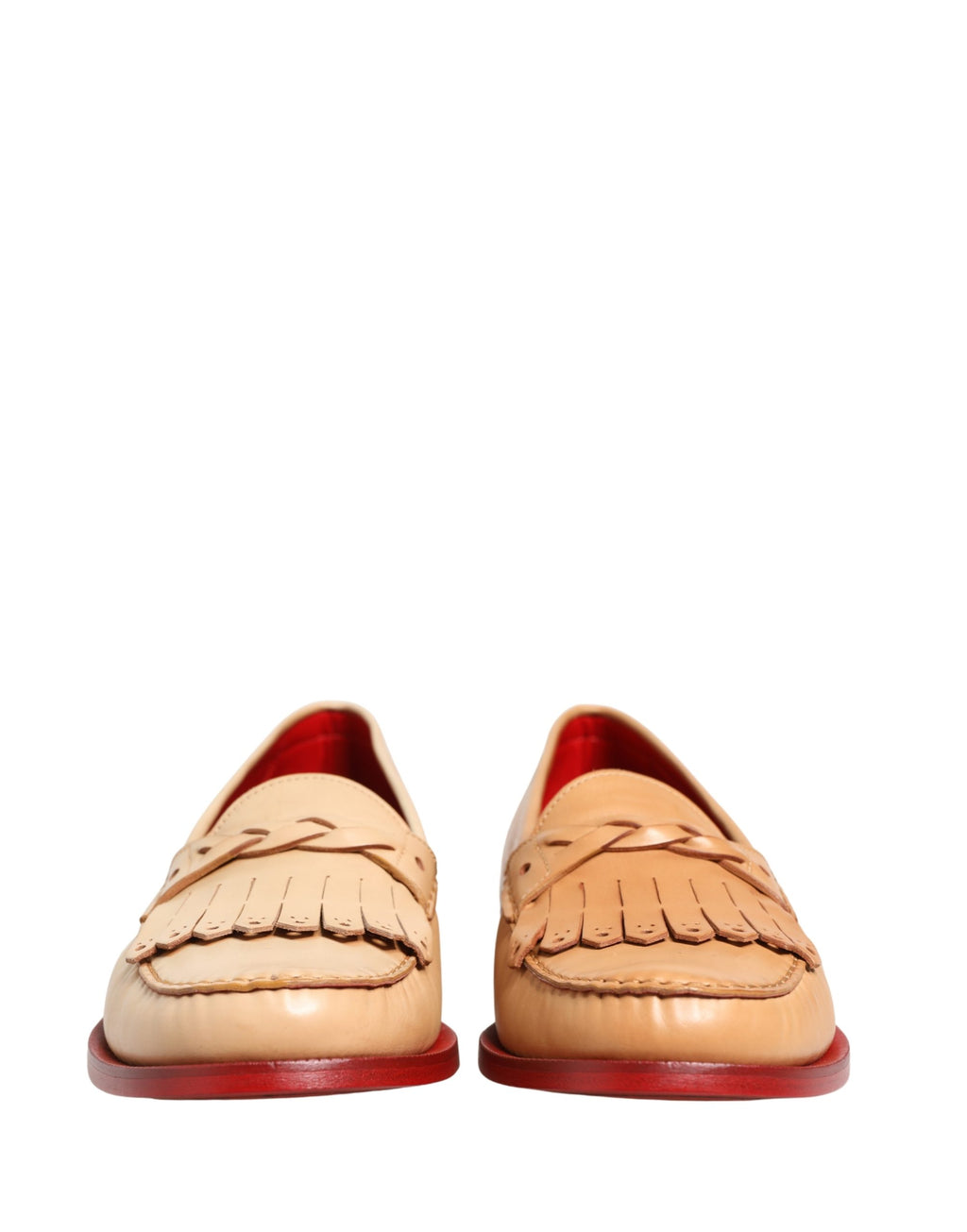 Chaussures mocassins en cuir beige avec pompons en peau de daim pour homme de Dolce & Gabbana, slip-on élégants et confortables.