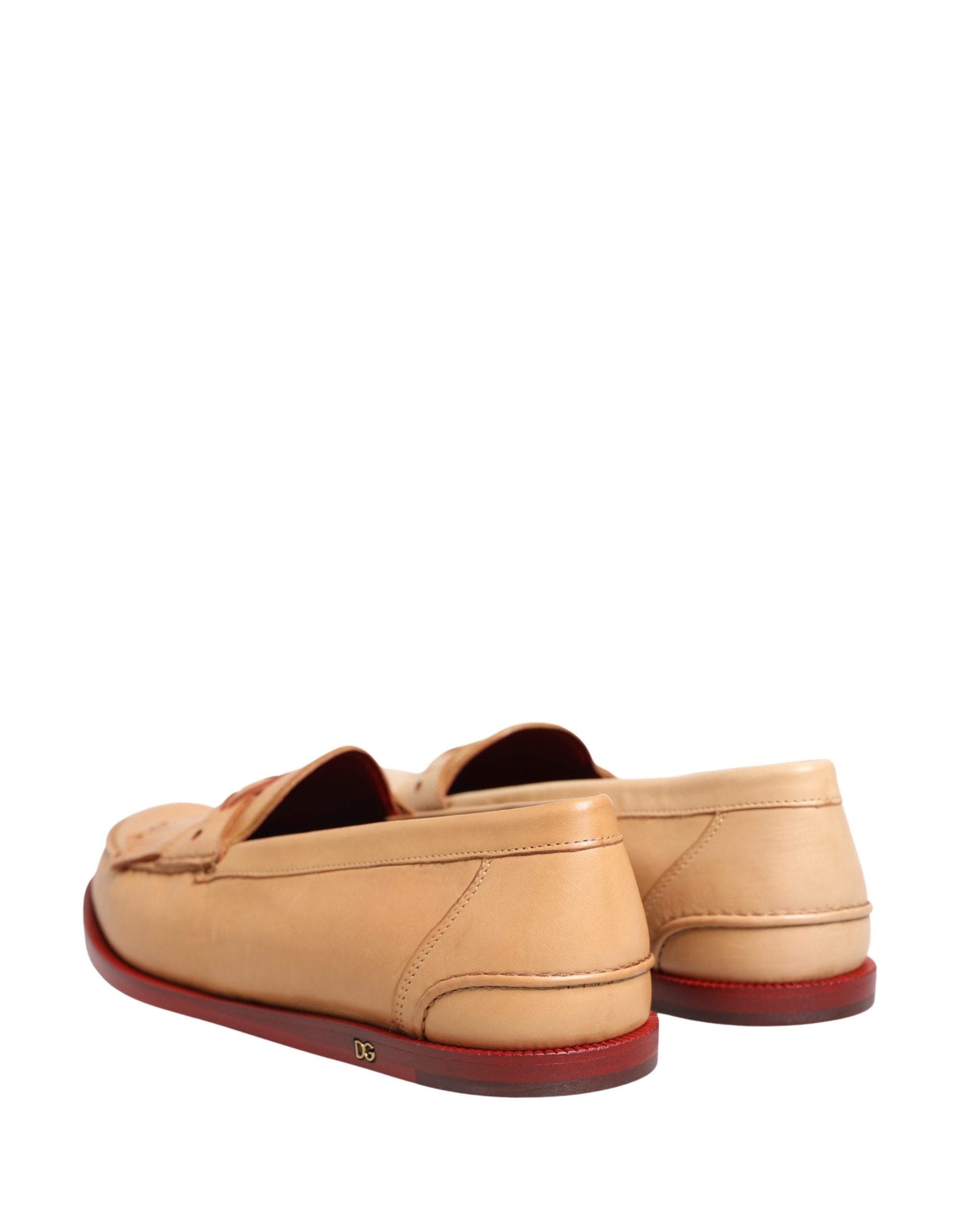 Chaussures mocassins en cuir beige Dolce & Gabbana pour homme avec pompons et talon plat, élégantes et confortables.