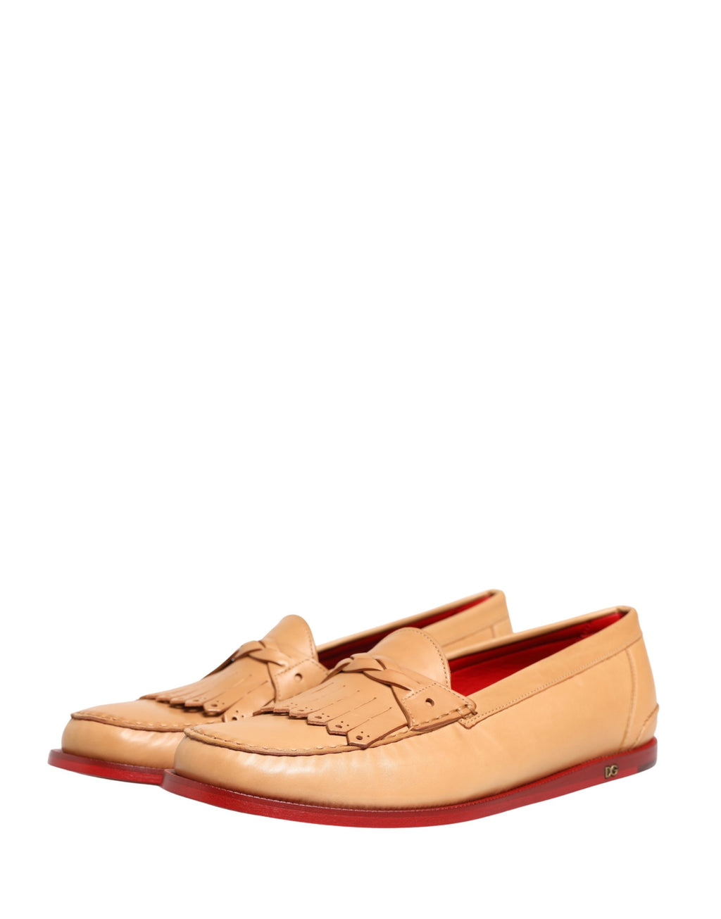 Chaussures mocassins pour homme Dolce & Gabbana en cuir beige avec pompons, style slip-on et détails de franges en cuir.