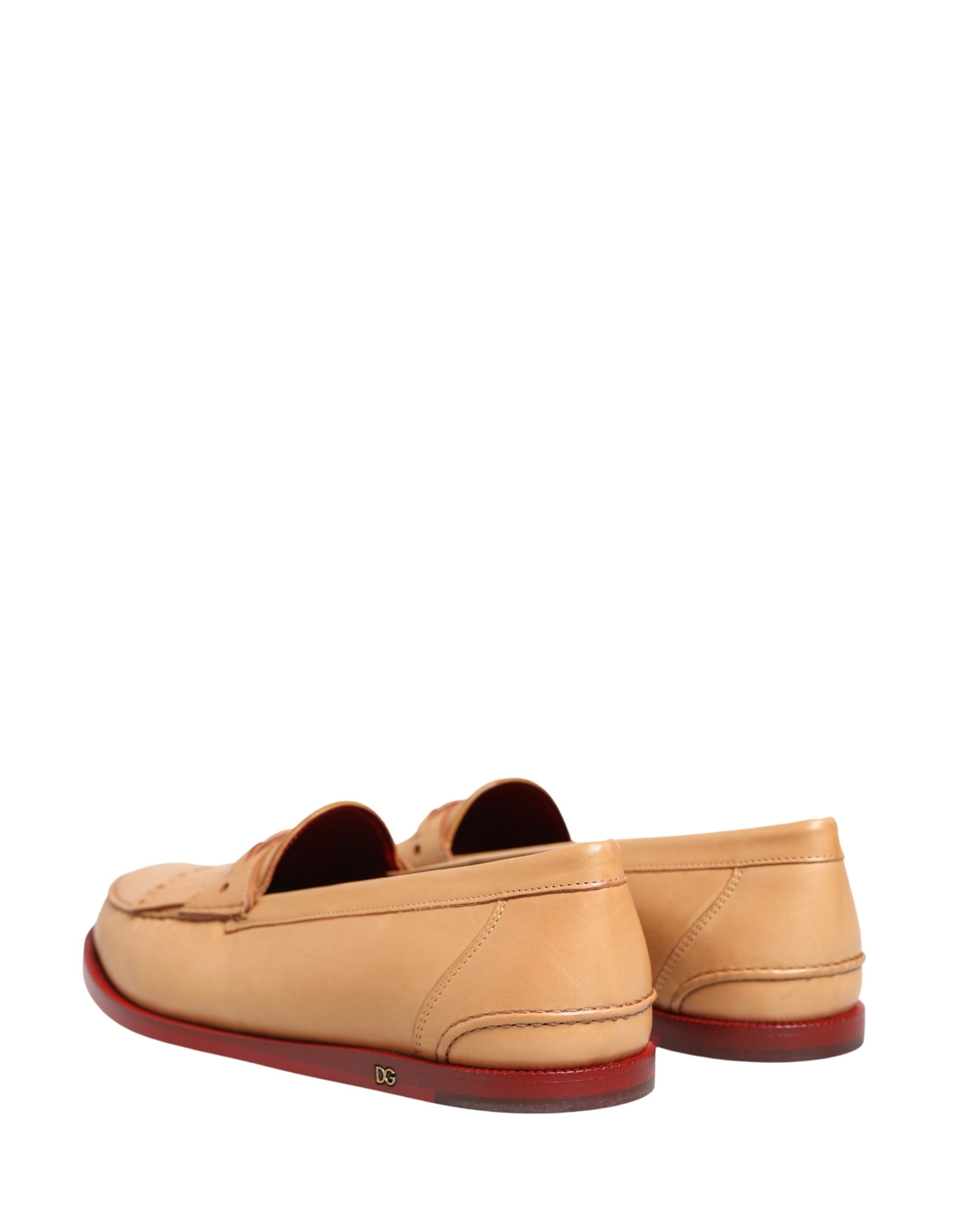 Chaussures mocassins pour homme Dolce & Gabbana beige en cuir avec pampilles et semelle confortable, style élégant et sophistiqué.