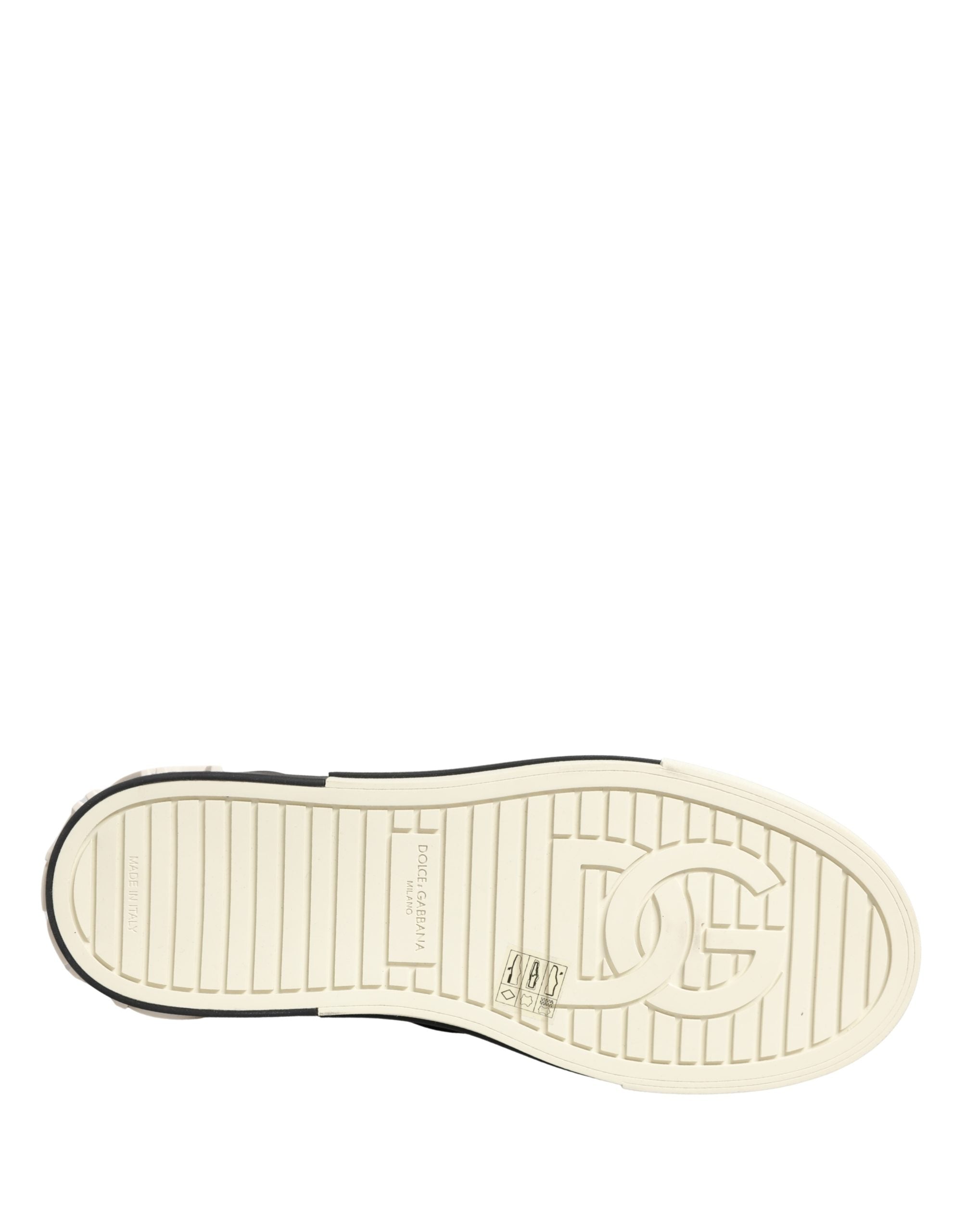 Chaussures Dolce & Gabbana sneakers basses en cuir noir matelassé, style slip-on, vue de face.