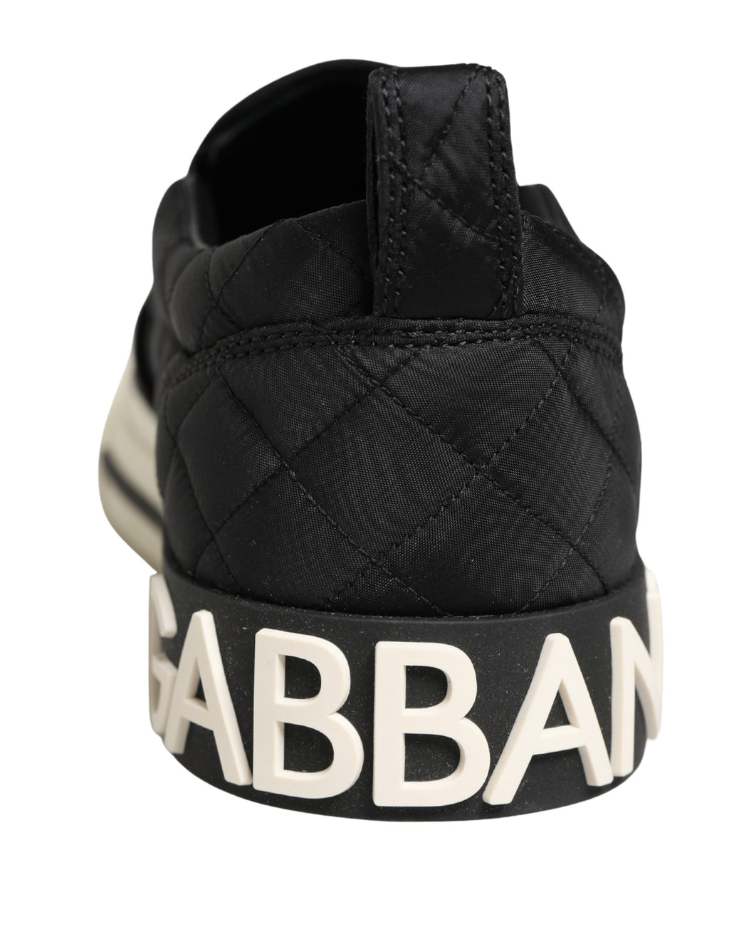Chaussures sneakers basses noires Dolce & Gabbana à motif matelassé et style slip-on tendance.