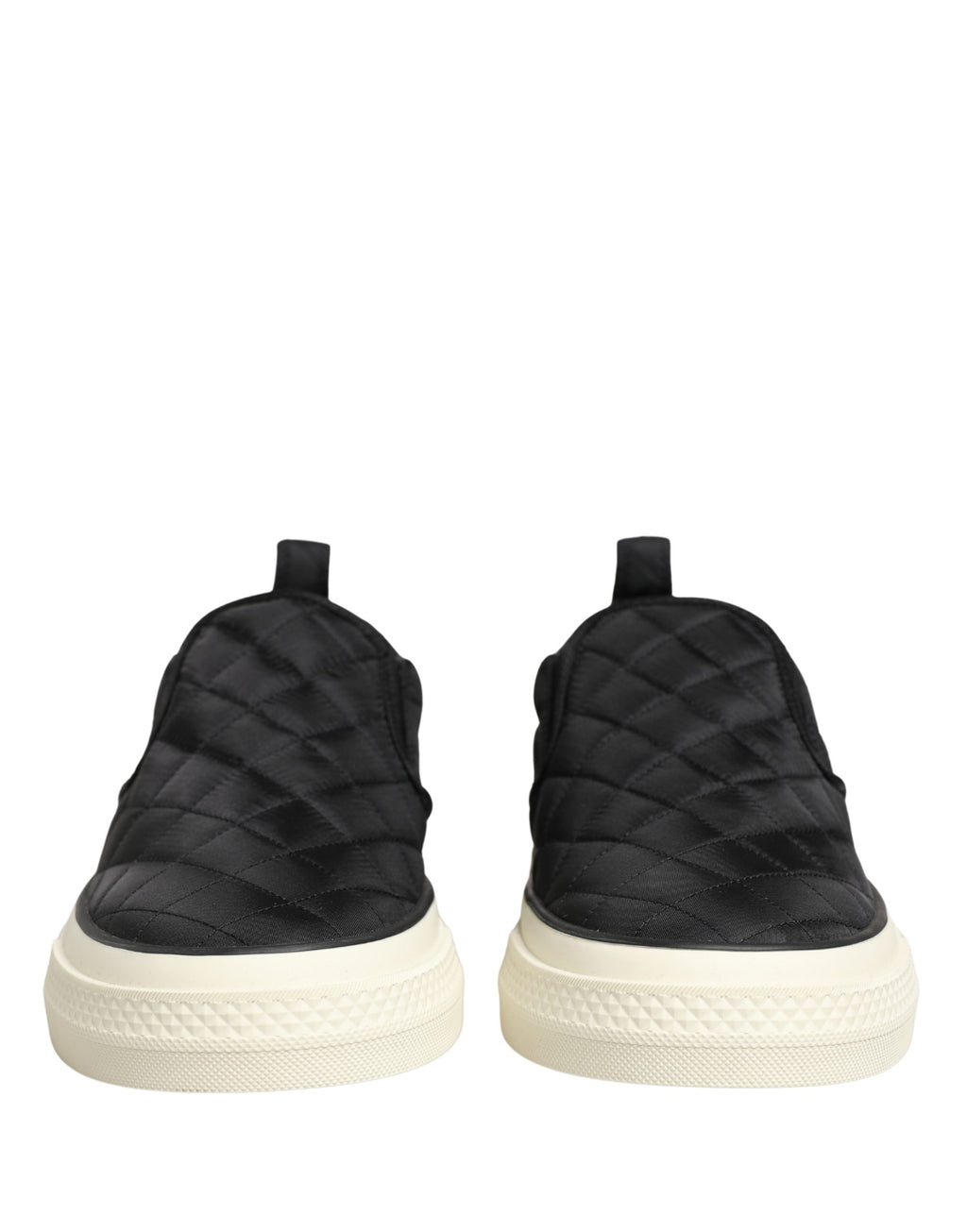 Chaussures sneakers basses noires Dolce & Gabbana en cuir matelassé avec semelle blanche, style slip-on élégante et confortable.