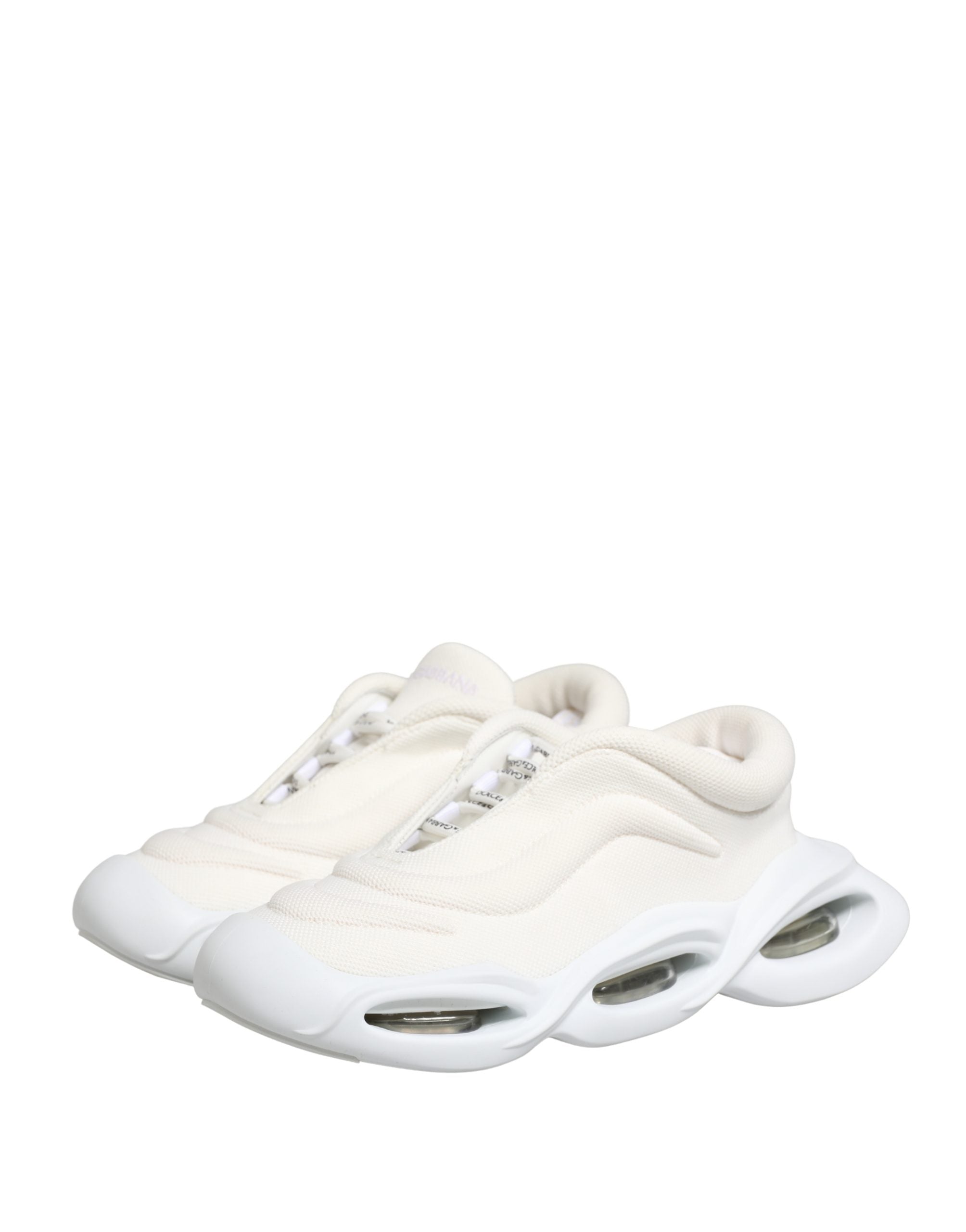 Chaussures sneakers basses blanches Dolce & Gabbana Slip On Wave LowTop, vue de face avec design épuré et détails modernes.