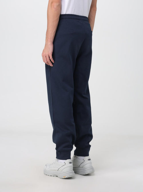 Joggeurs en coton bleu Armani Exchange, pantalon de sport décontracté avec ceinture élastique et poches latérales.