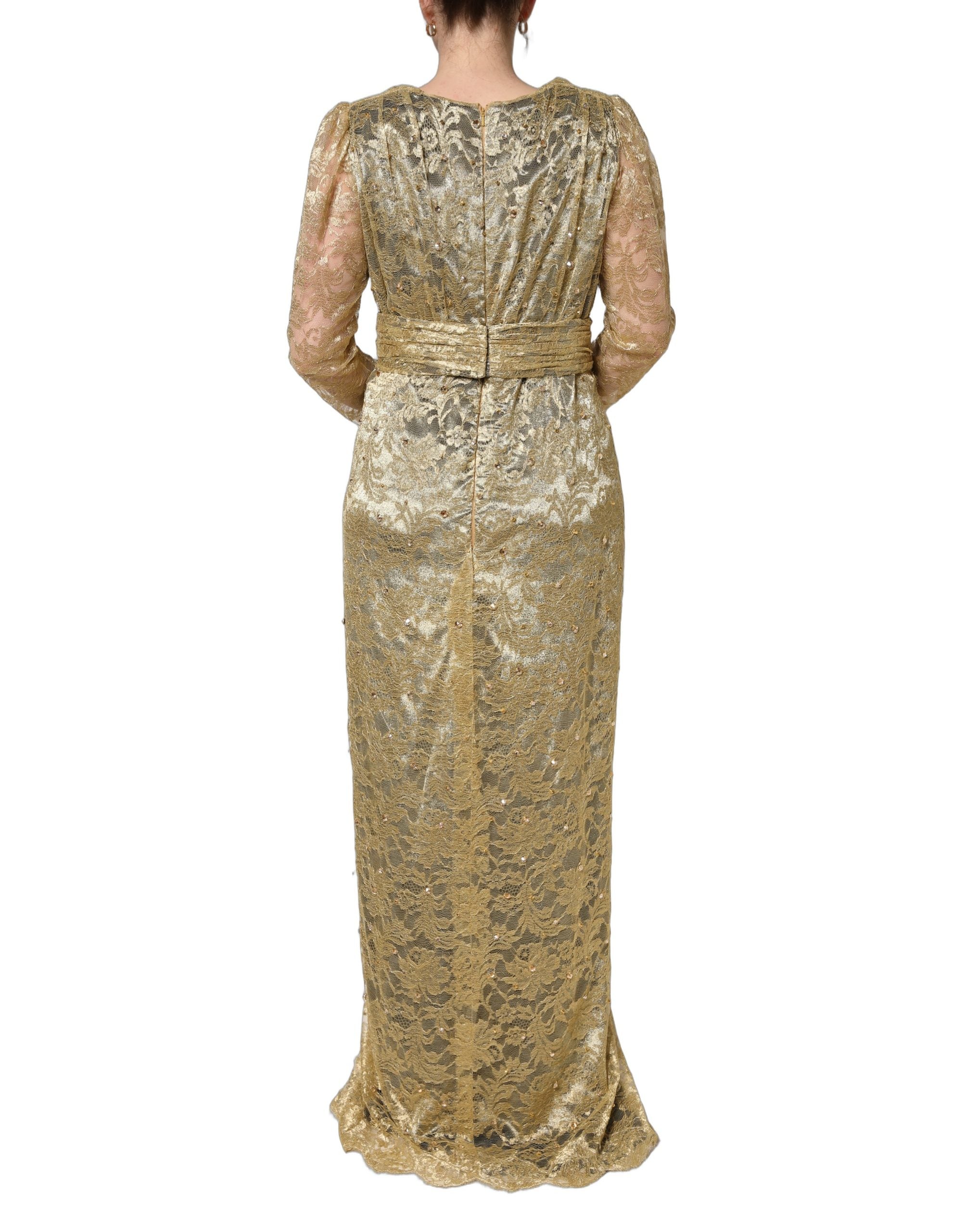 Robe en dentelle transparente dorée Dolce & Gabbana ornée de cristaux brillants, élégante et sophistiquée.