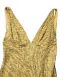 Robe de soirée sirène Dolce & Gabbana en sequins dorés avec décolleté en V. Longue robe élégante et brillante.
