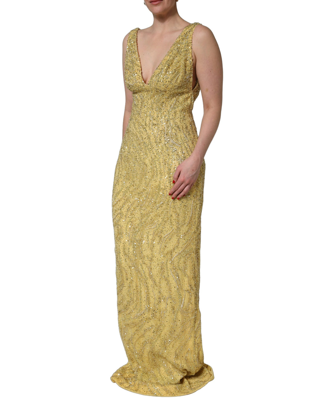 Robe de soirée sirène dorée Dolce & Gabbana avec décolleté en V et sequins brillants, longueur longue et silhouette élégante.