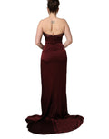 Robe de soirée Dolce & Gabbana rouge bordeaux avec embellissements, décolleté en V et élégance sophistiquée.