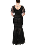 Robe de soirée sirène noire ornée de sequins de Dolce & Gabbana, style élégant et glamour pour occasions spéciales.