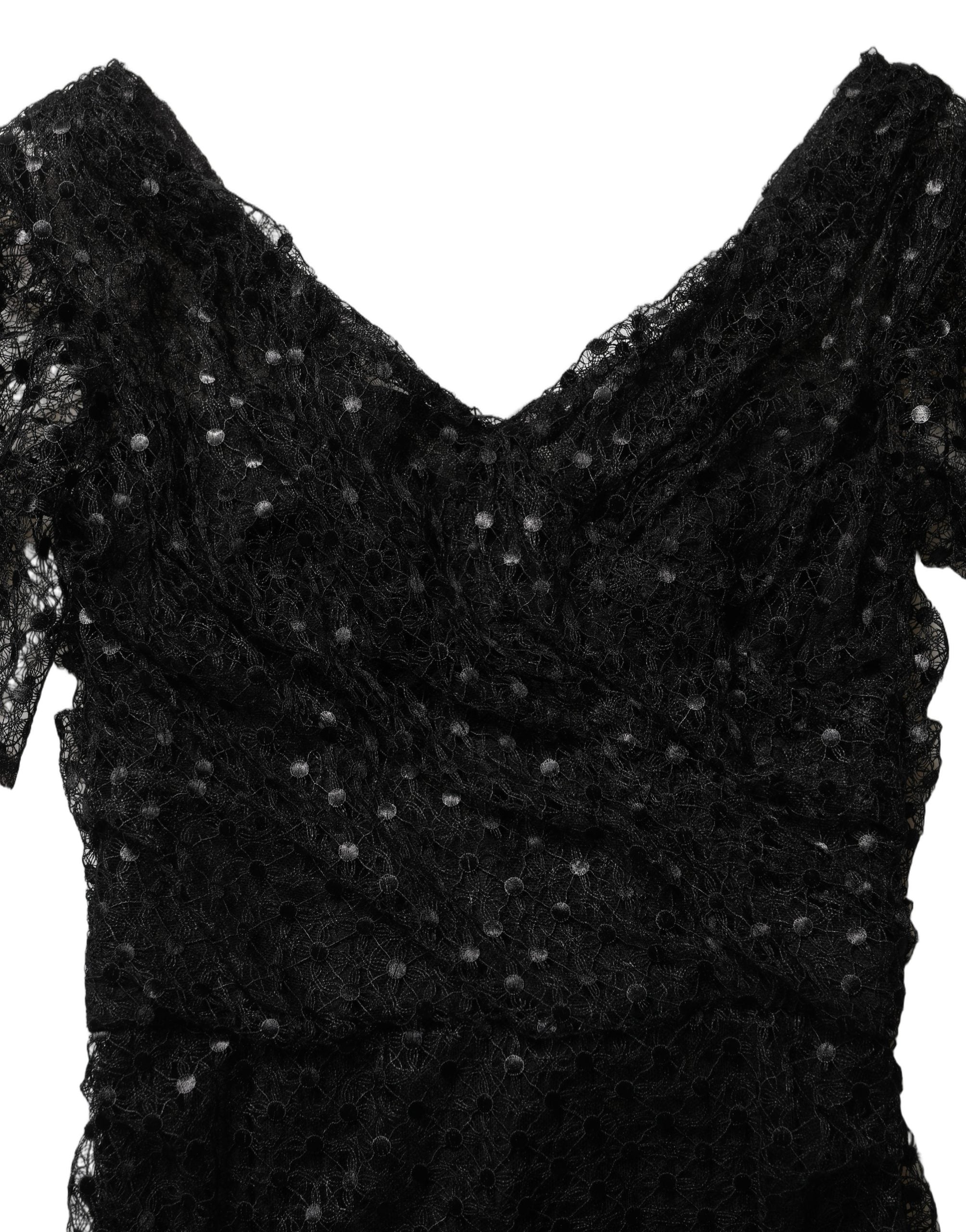 Robe de soirée sirène noire en sequins de Dolce & Gabbana, élégante et brillante, avec décolleté profond et détails sophistiqués.