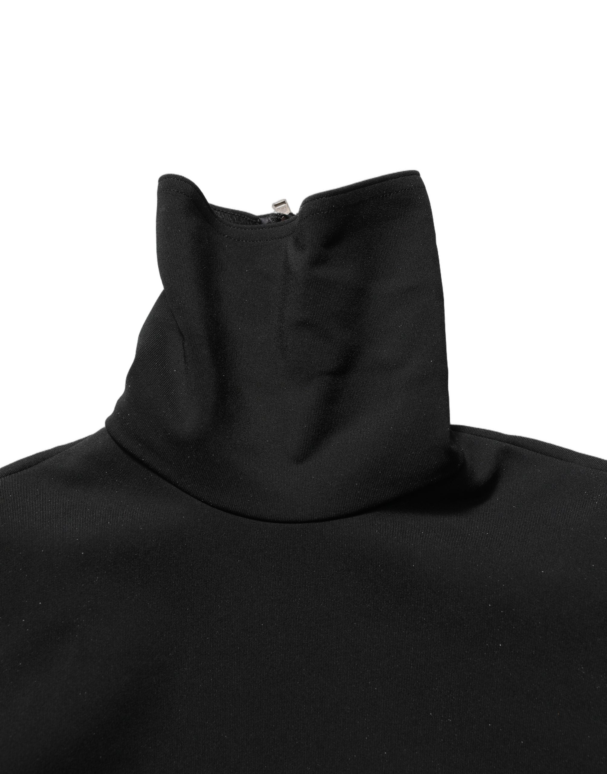 Robe longue noire Dolce & Gabbana à manches longues en viscose, coupe ajustée et élégante, portée avec un style sophistiqué