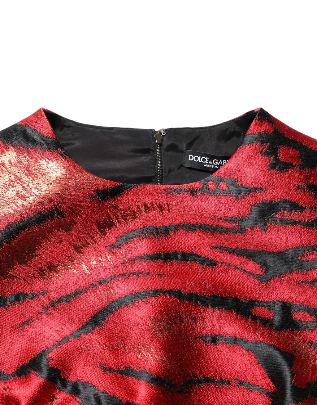 Robe évasée Dolce & Gabbana à motif tigre rouge et noir en jacquard, élégante et sophistiquée.
