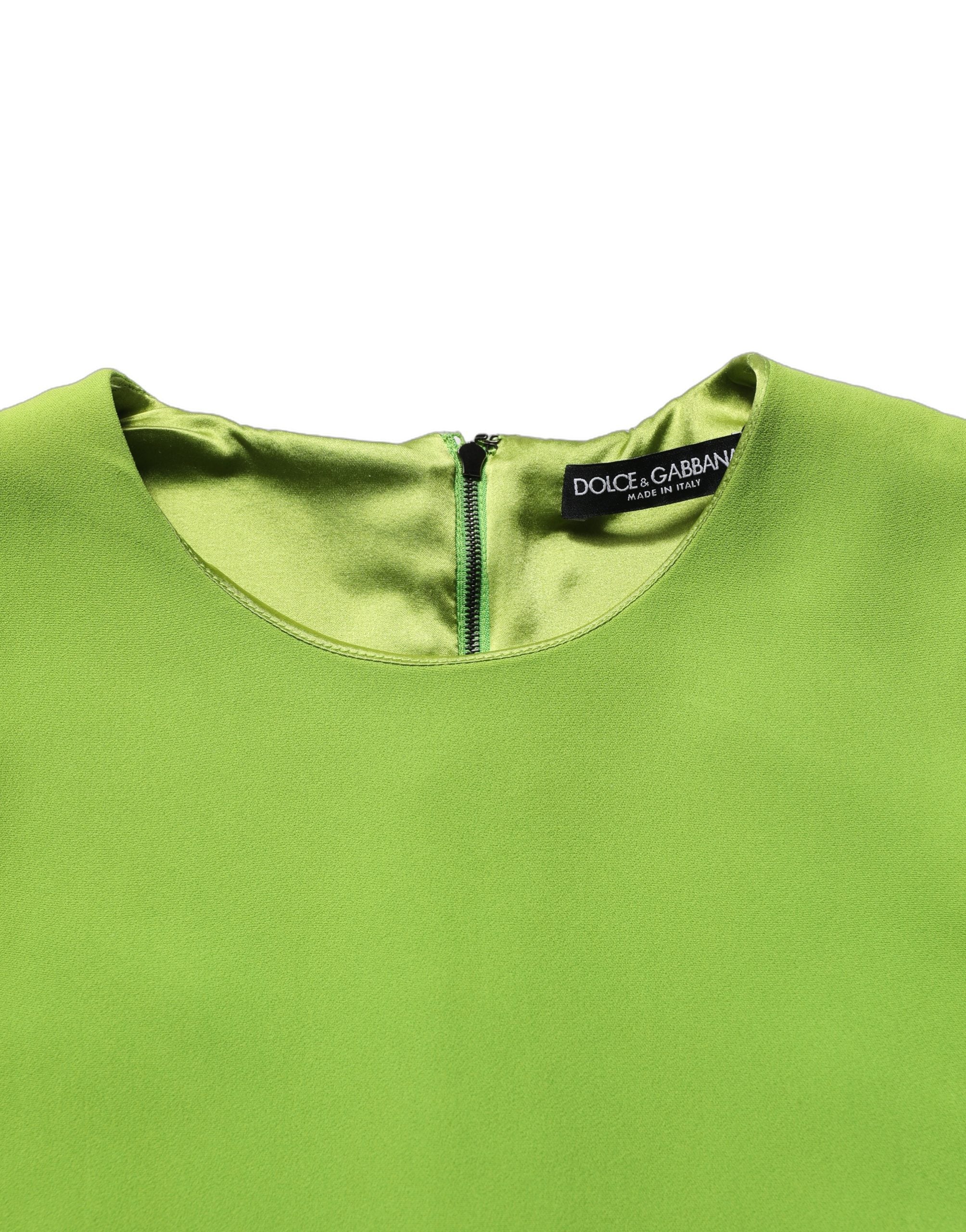 Robe courte sans manches Dolce & Gabbana en viscose verte, coupe évasée et style A-line, visible avec détails de design.