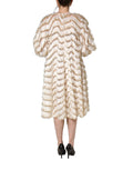 Robe midi Dolce & Gabbana ivoire à franges et superpositions, style shift élégant, vue de face.