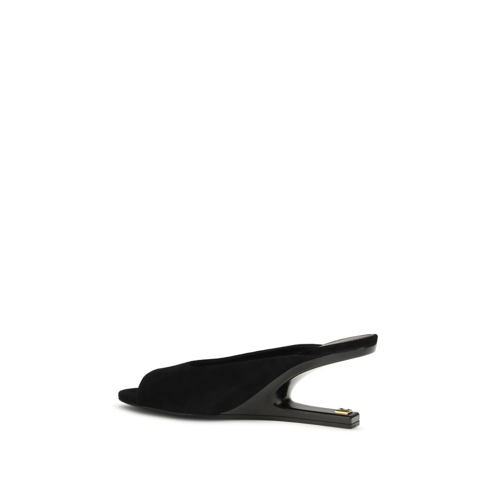 Mules en cuir de chèvre noir Balmain, chaussures élégantes à talon pour femme, visibles en gros plan sur fond neutre.