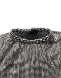 Combinaison courte en robe body Dolce & Gabbana en dentelle argentée à manches longues et brillants.