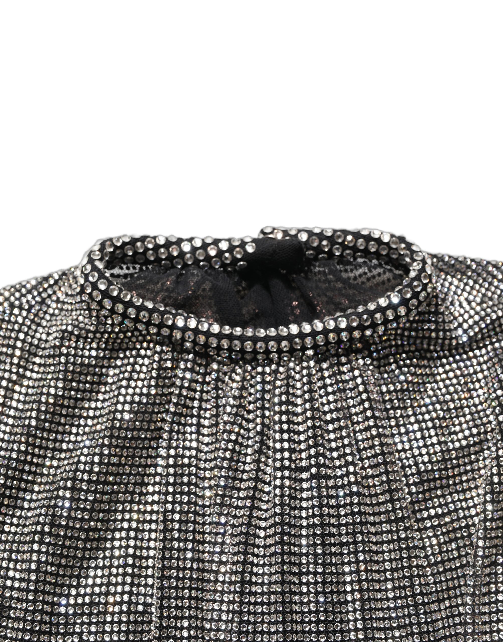 Combinaison courte en robe body Dolce & Gabbana en dentelle argentée à manches longues et brillants.