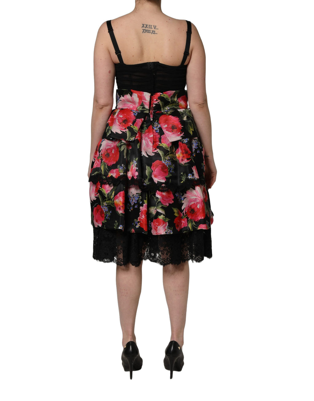 Robe bustier sans manches Dolce & Gabbana noire avec imprimé floral, jupe à plusieurs niveaux et style élégant.