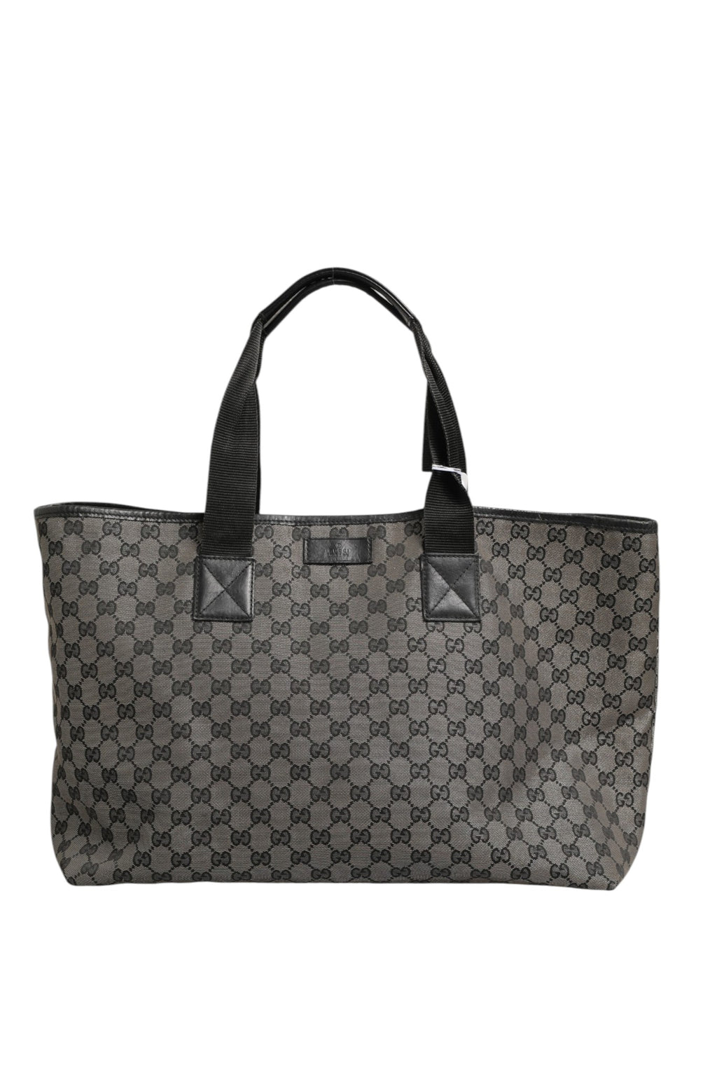 Sac à main Gucci GG en toile, grand modèle tote avec poignées robustes et logo emblématique, pour un style élégant.