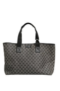 Sac à main Gucci GG en toile, grand modèle tote avec poignées robustes et logo emblématique, pour un style élégant.