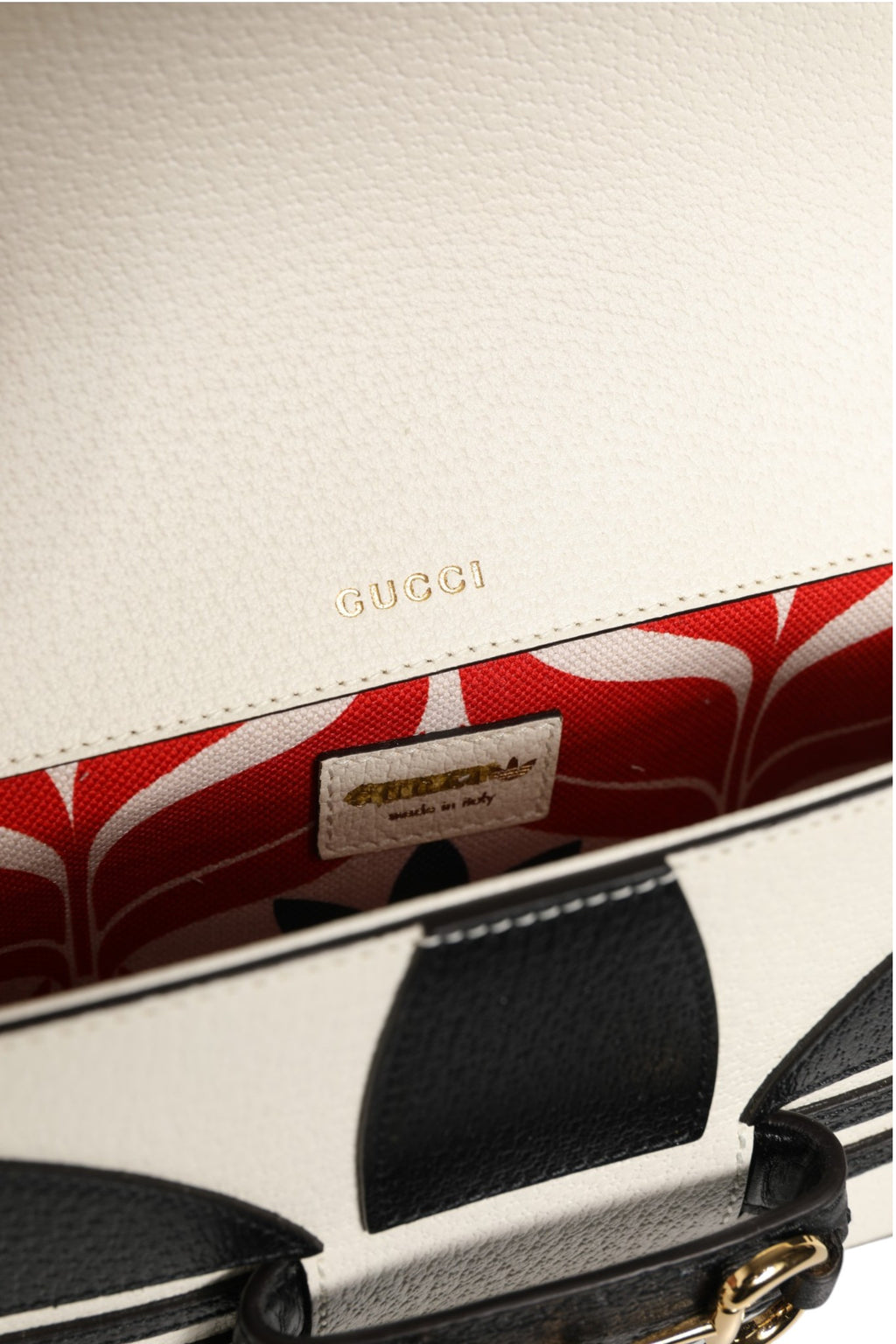 Sac Gucci x Adidas Horsebit 1955 à bandoulière noir et blanc, en toile avec détails en métal, élégant et tendance.