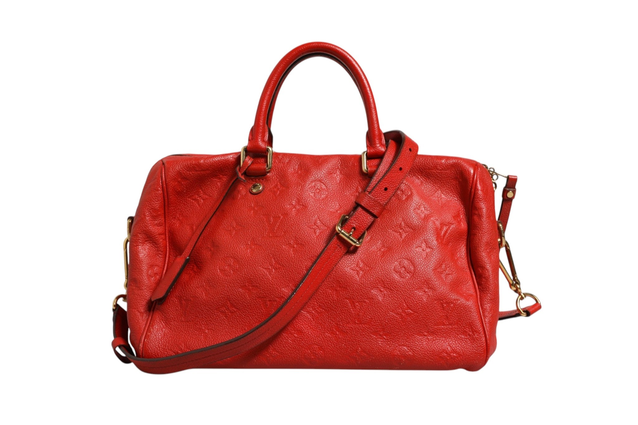 Sac à main Louis Vuitton Speedy Bandoulière 30 en cuir Monogram Empreinte rouge, avec logo LV et bandoulière réglable.