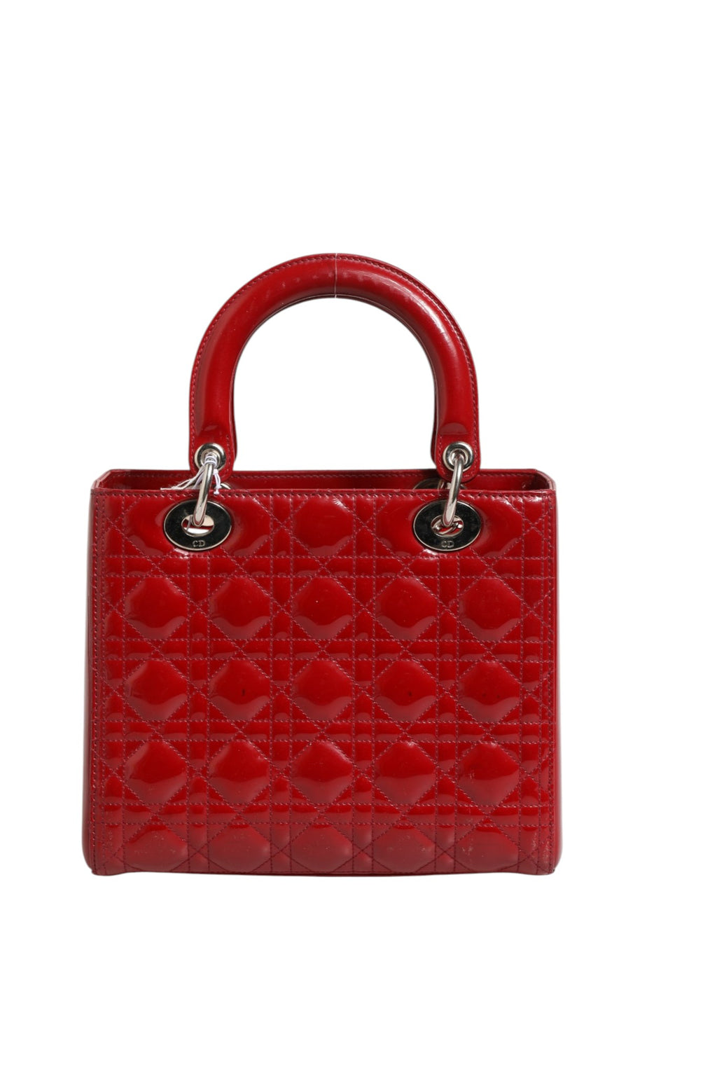 Sac à main Christian Dior Lady Dior en cuir verni rouge cerise avec quilting Cannage et petites dimensions.