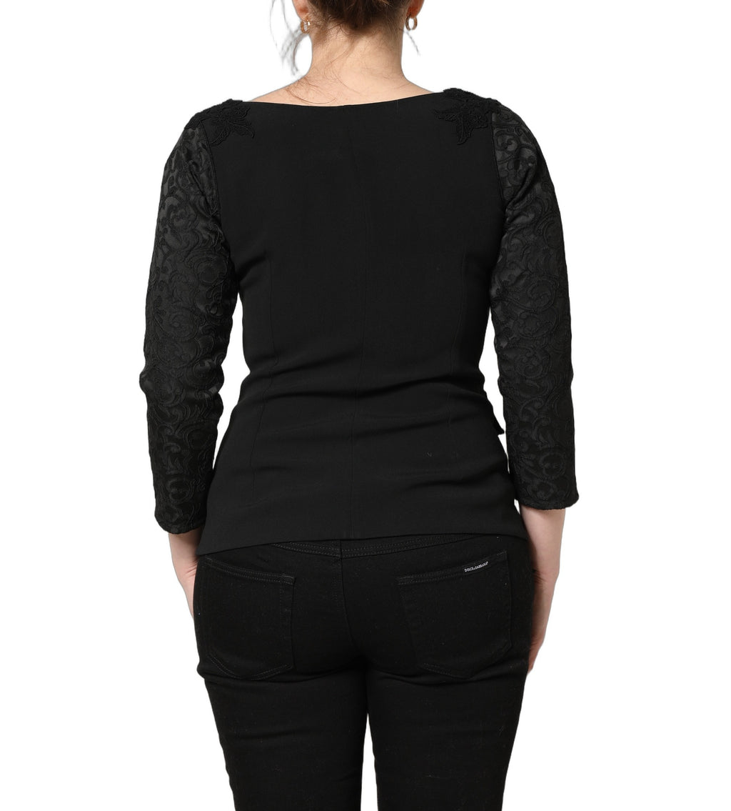 Blazer noir Dolce & Gabbana avec boutons, détails en dentelle et finition élégante, vue de face sur fond blanc.