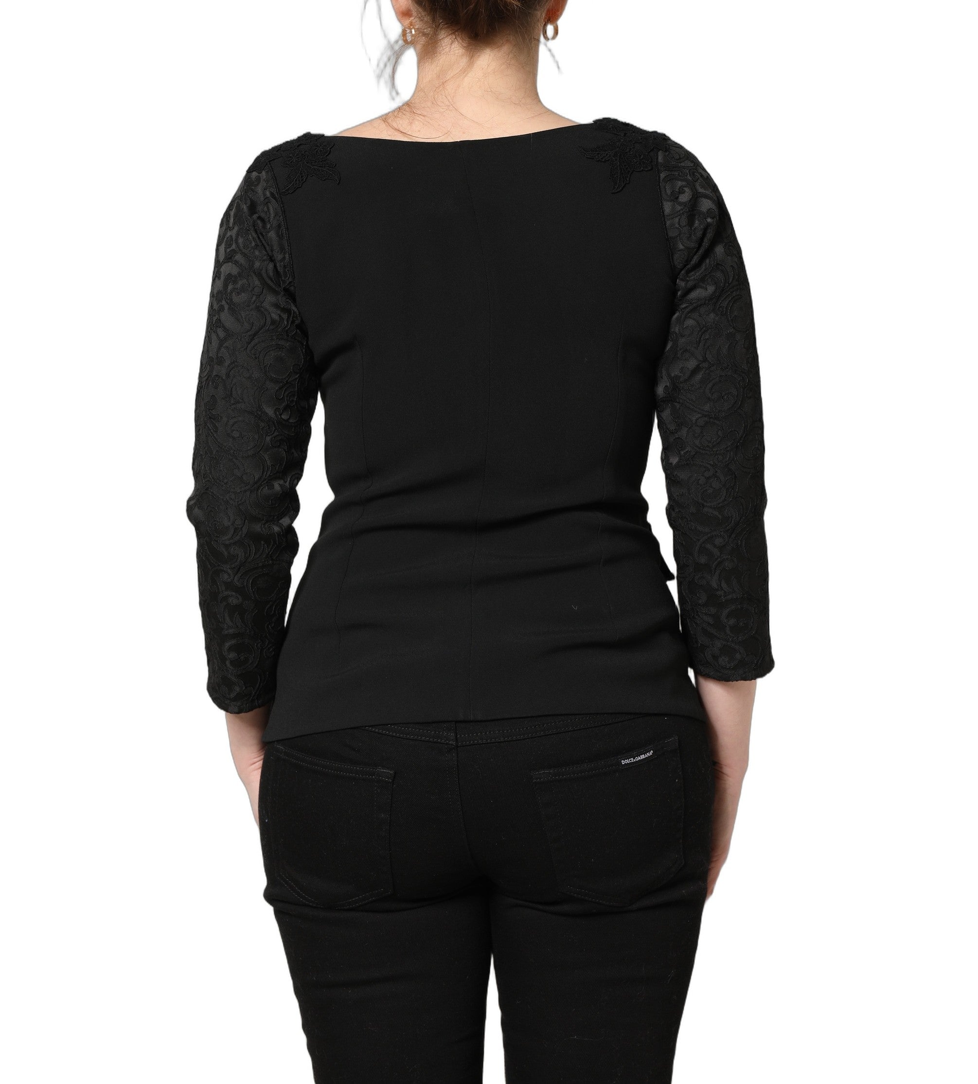 Blazer noir Dolce & Gabbana avec boutons, détails en dentelle et finition élégante, vue de face sur fond blanc.