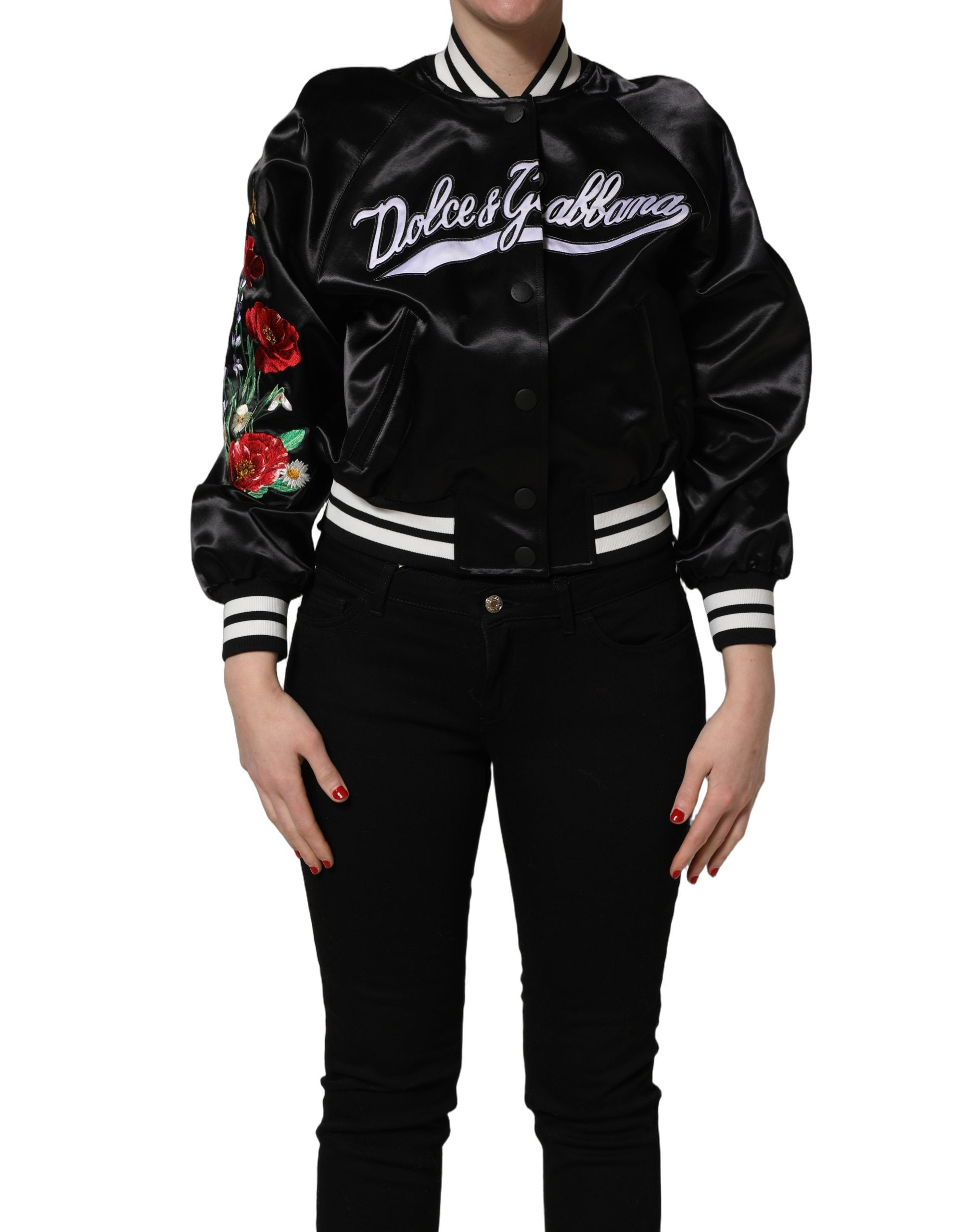 Veste bomber en satin noir avec broderies florales de Dolce & Gabbana, élégante et ornée de détails sophistiqués.