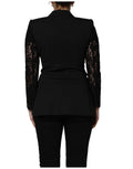 Veste en laine noire Dolce & Gabbana à double boutonnage avec manches en dentelle élégantes.