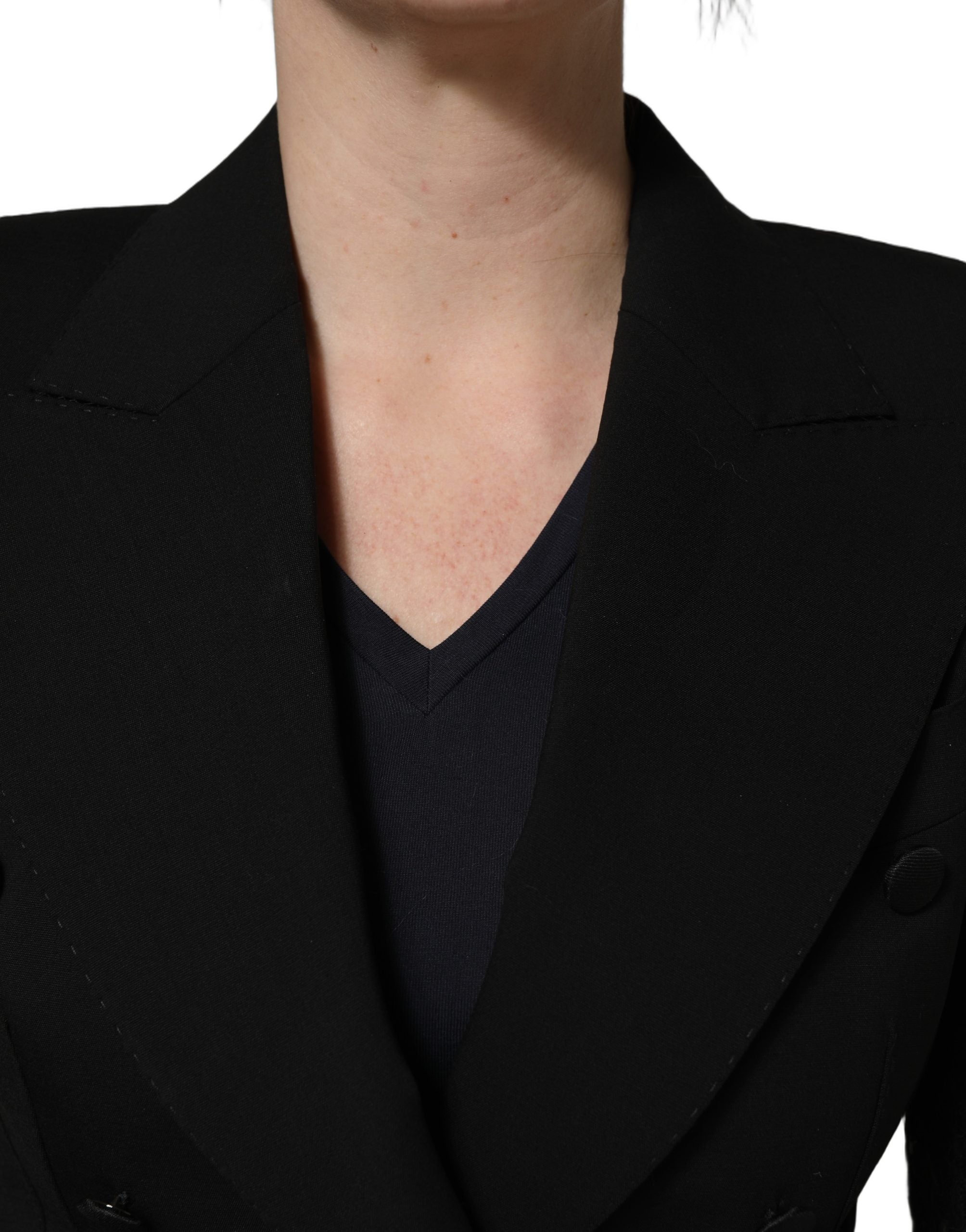 Veste noire en laine Dolce & Gabbana avec double boutonnage et manches en dentelle élégante.