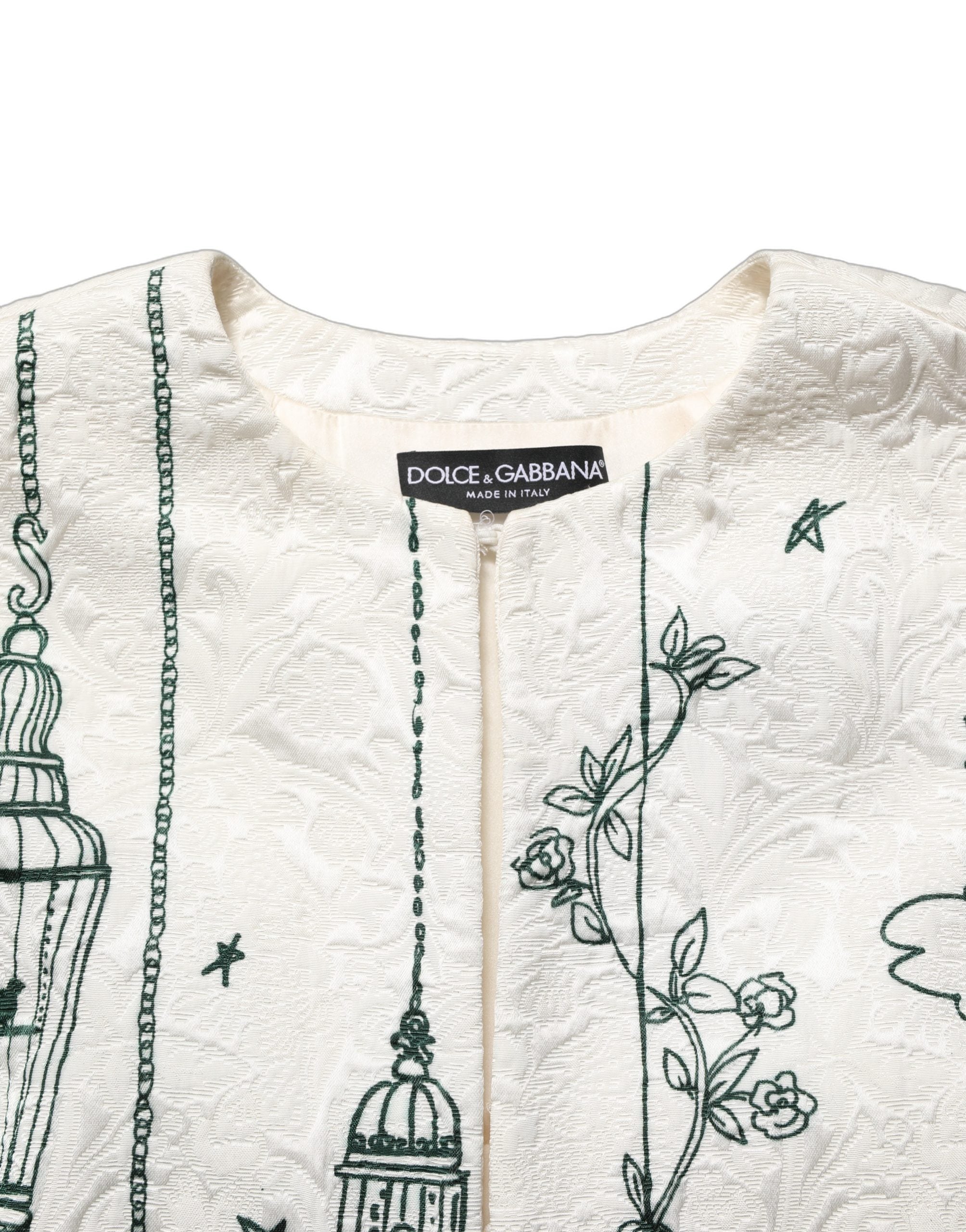 Veste Dolce & Gabbana en jacquard blanc avec motif floral jardin, coupe élégante et détails sophistiqués.