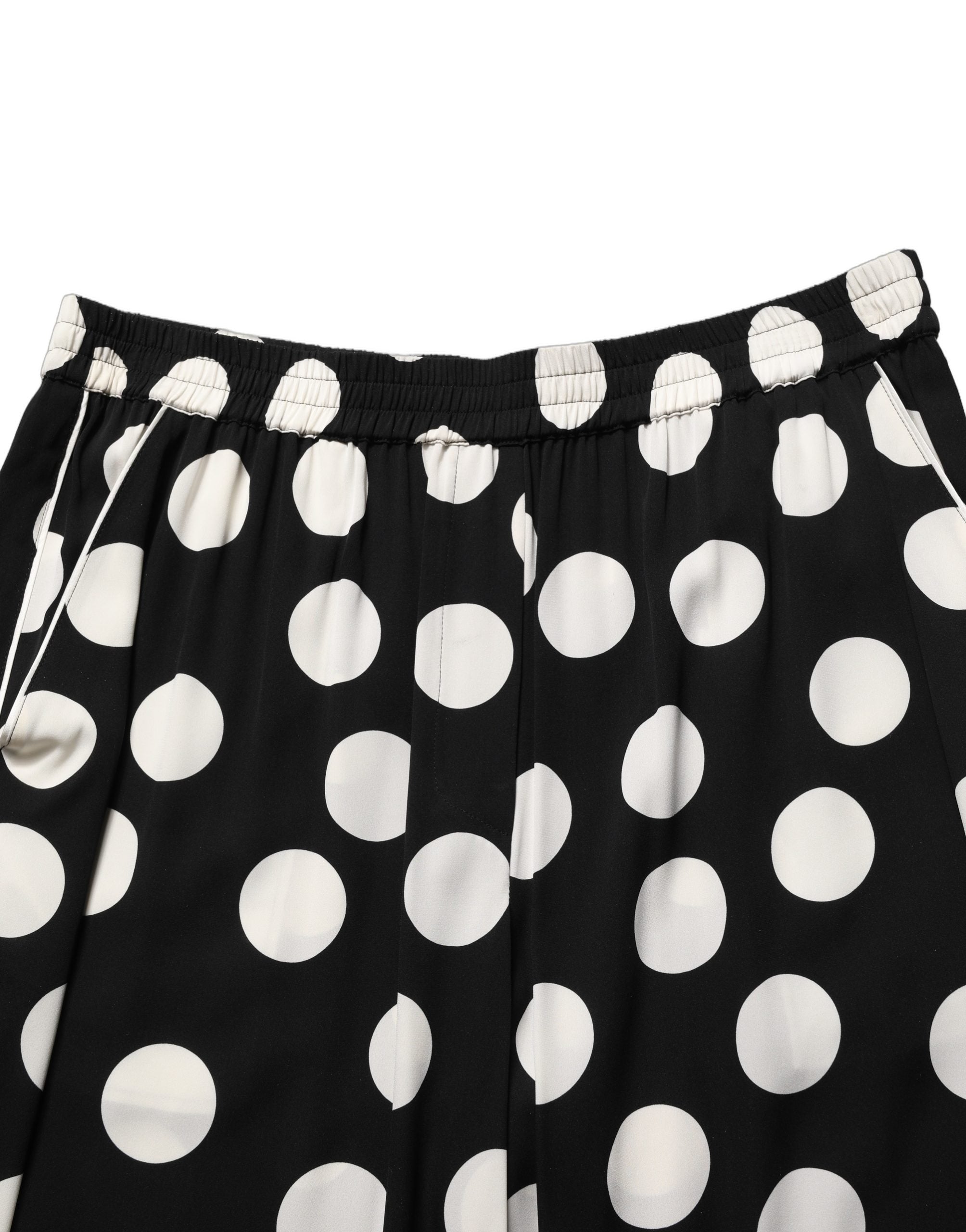 Pyjama deux pièces Dolce & Gabbana à pois noir et blanc, vêtement de nuit élégant avec haut et pantalon confortables.