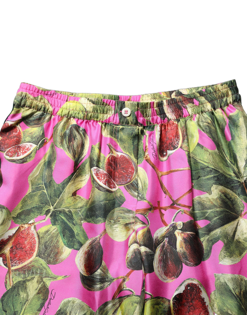 Pantalon fuselé Dolce & Gabbana Fuchsia Fig avec motif de feuilles de fruits, élégant et tendance.