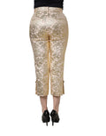 Pantalon court Dolce & Gabbana en jacquard doré floral lamé, style élégant et luxueux, vue de face.