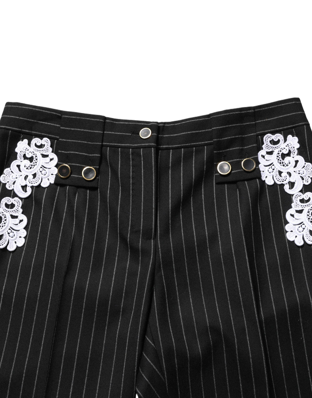 Pantalons cropped noirs Dolce & Gabbana avec application en dentelle et rayures, style élégant et sophistiqué.