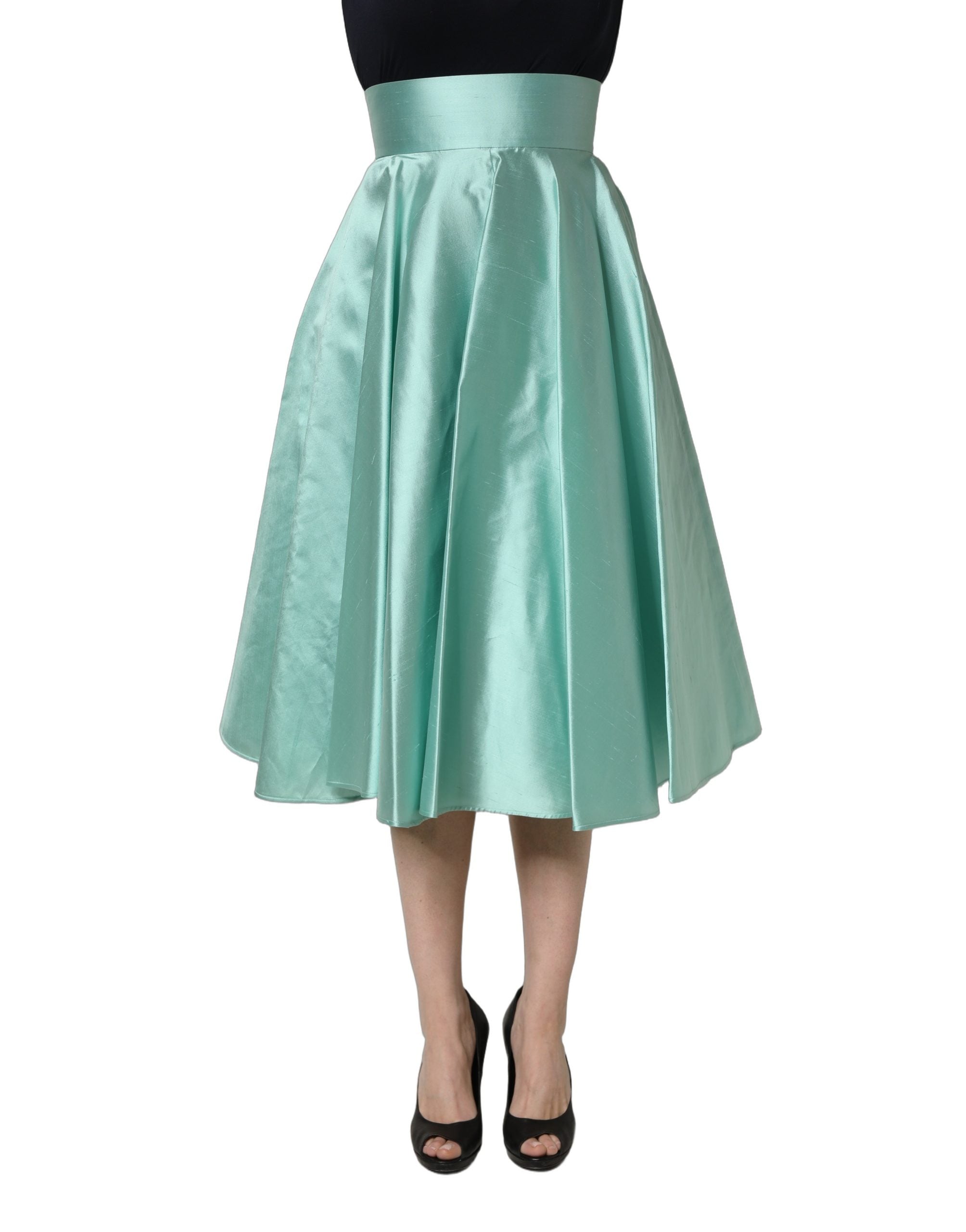 Jupe midi plissée en satin vert à taille haute de Dolce & Gabbana, style élégant et féminin.
