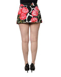 Mini jupe en jacquard Dolce & Gabbana avec imprimé floral rose noir et rose, style élégant et féminin.