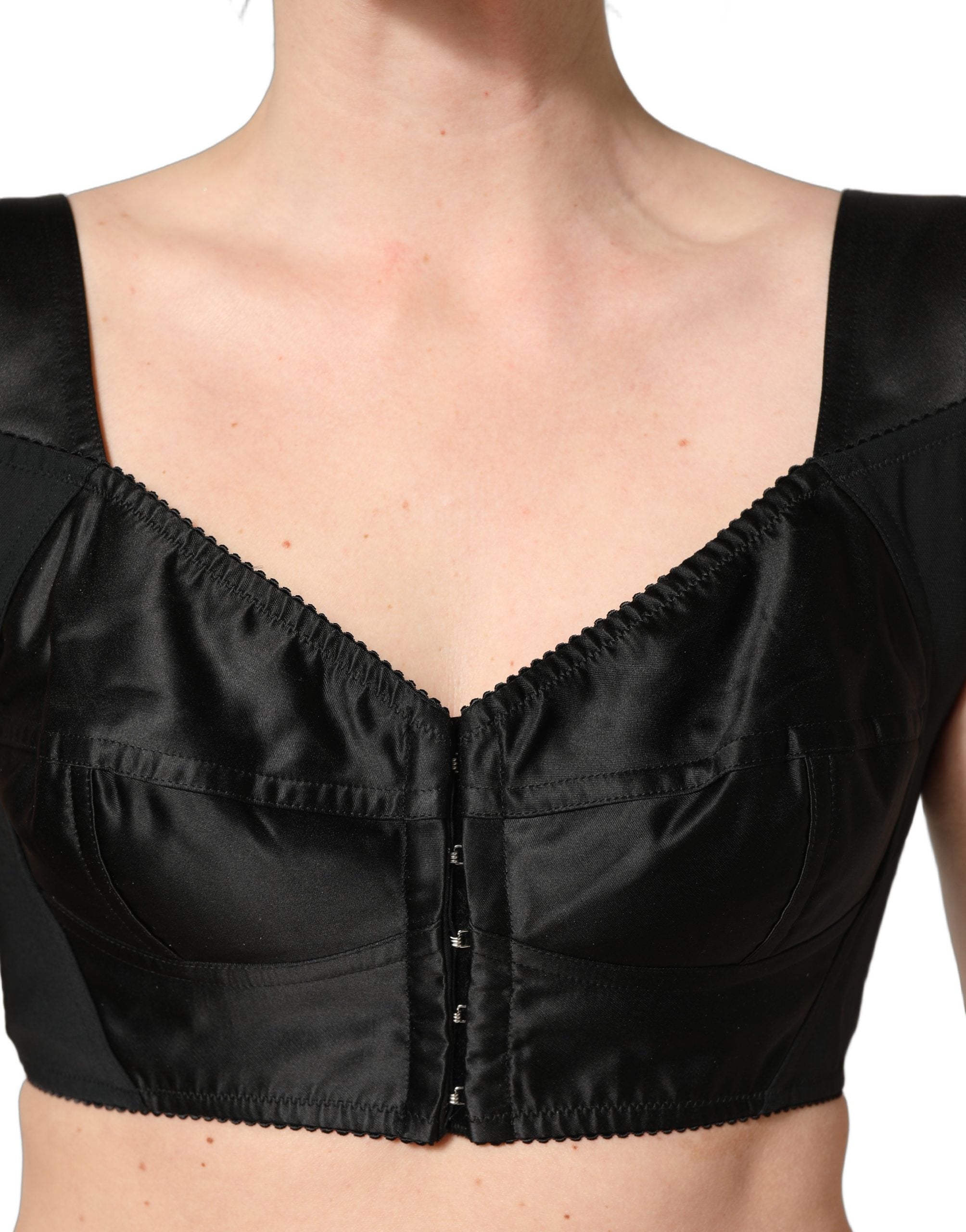 Corset sans manches Dolce & Gabbana en satin noir et nylon, haut court ajusté et élégant.