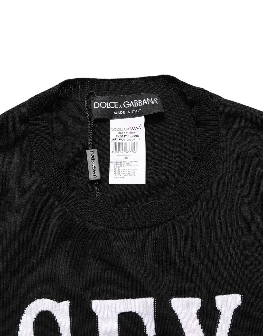 Top à manches longues Dolce & Gabbana avec imprimé graphique noir, design élégant et moderne.