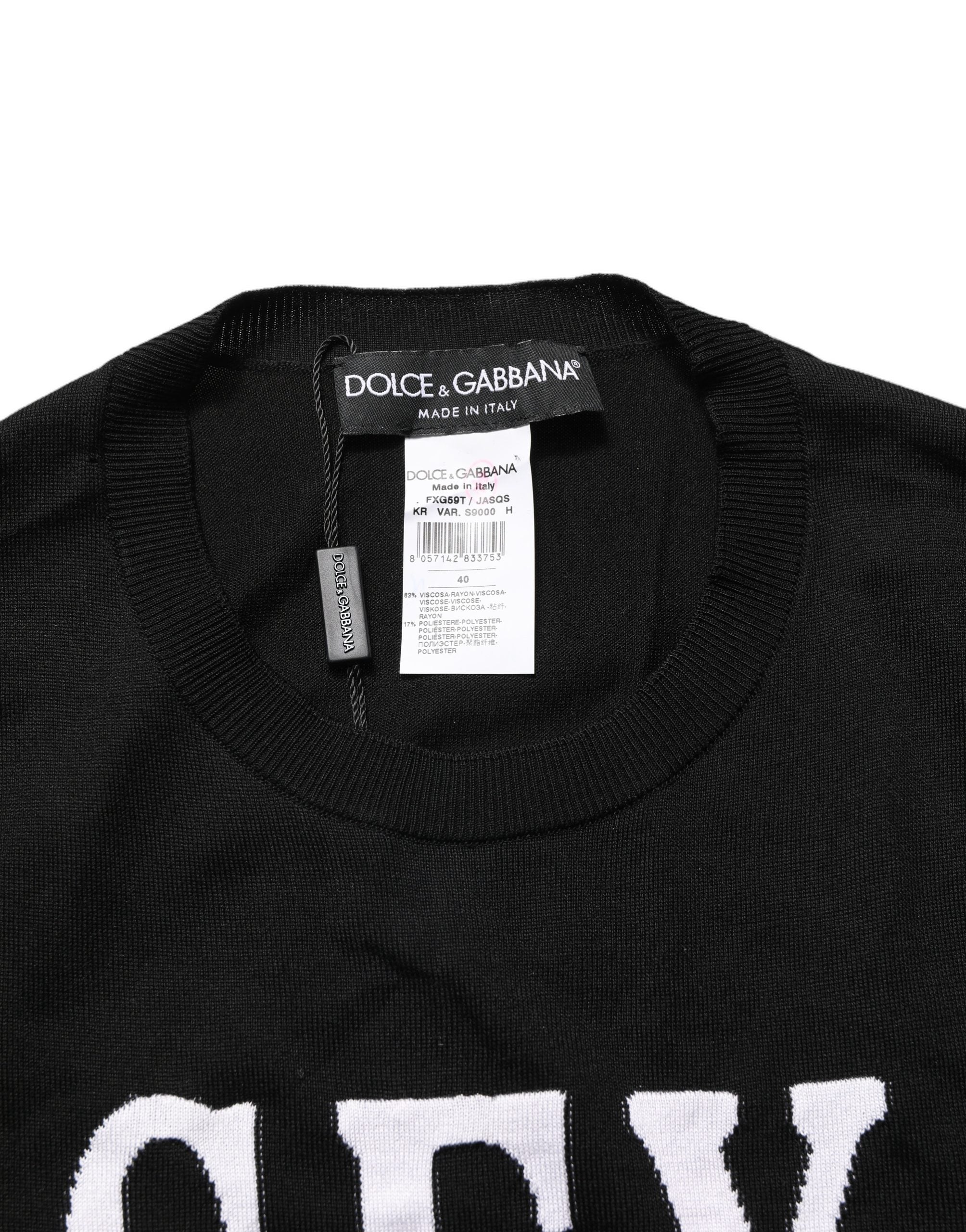 Top à manches longues Dolce & Gabbana avec imprimé graphique noir, design élégant et moderne.