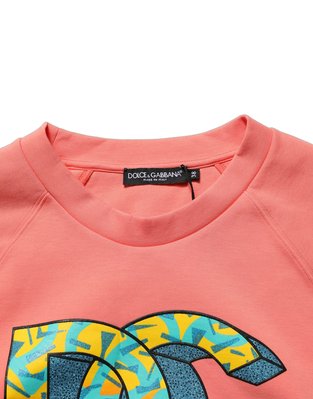 Sweat-shirt cropped rose à graphique Dolce & Gabbana avec col rond, en coton, vue de face.